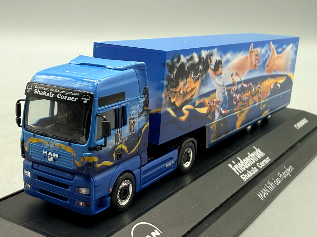 Modell LKW 1:87 Herpa MAN TGA XXL Friedenstruck mit OVP