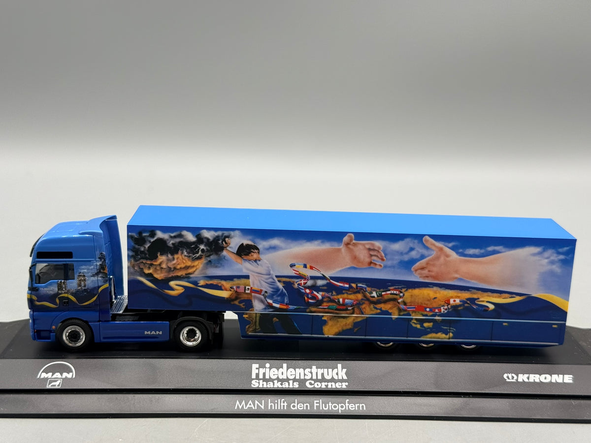 Modell LKW 1:87 Herpa MAN TGA XXL Friedenstruck mit OVP