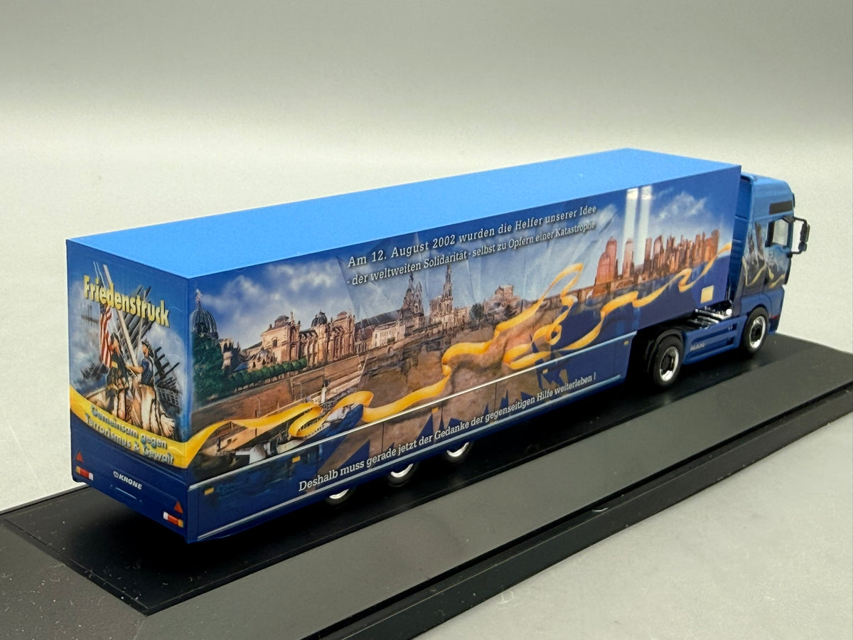 Modell LKW 1:87 Herpa MAN TGA XXL Friedenstruck mit OVP