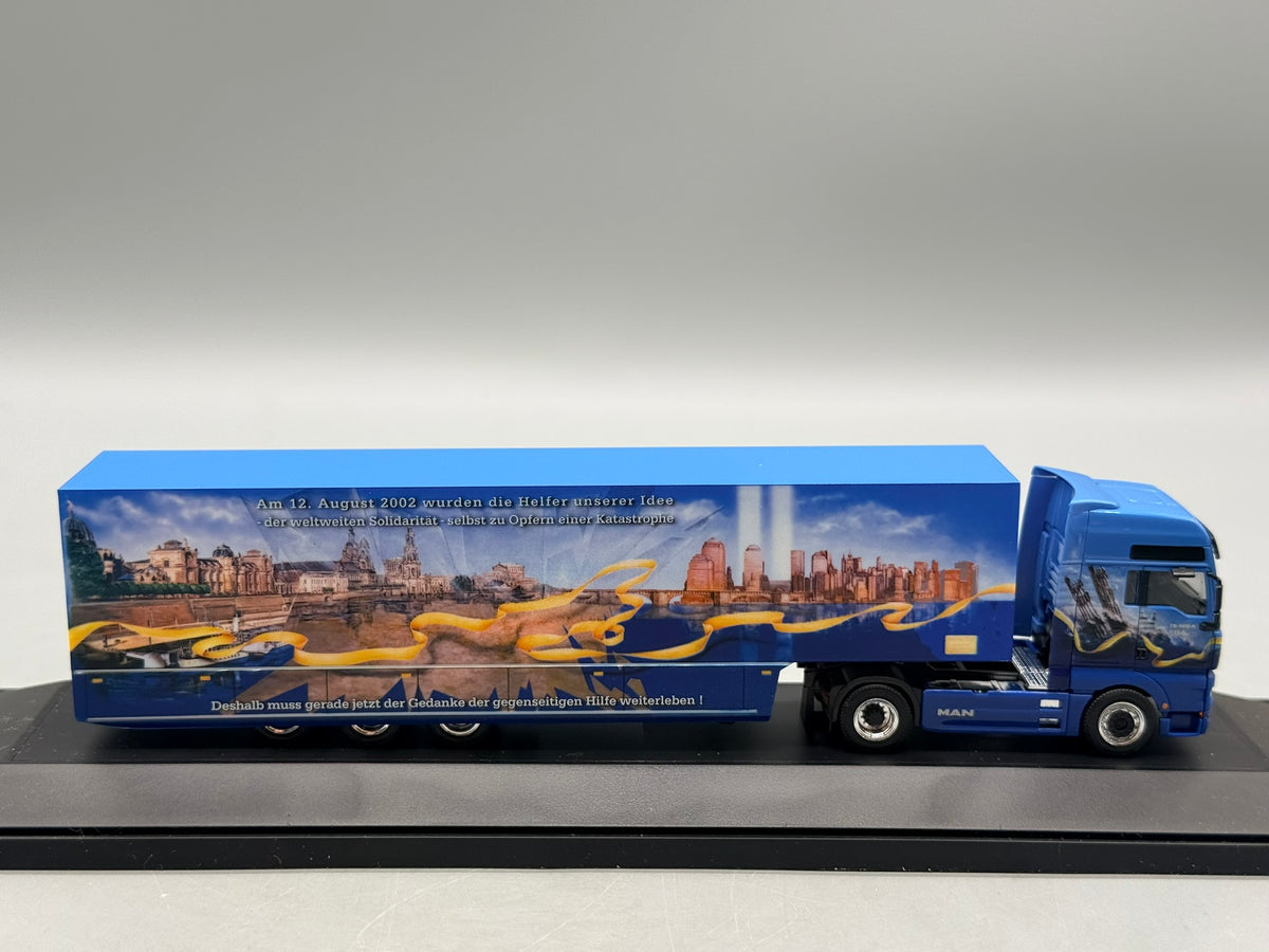 Modell LKW 1:87 Herpa MAN TGA XXL Friedenstruck mit OVP