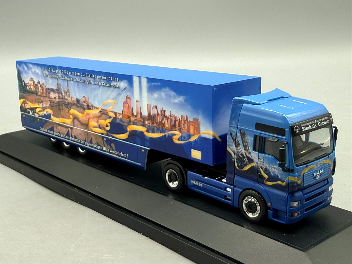 Modell LKW 1:87 Herpa MAN TGA XXL Friedenstruck mit OVP