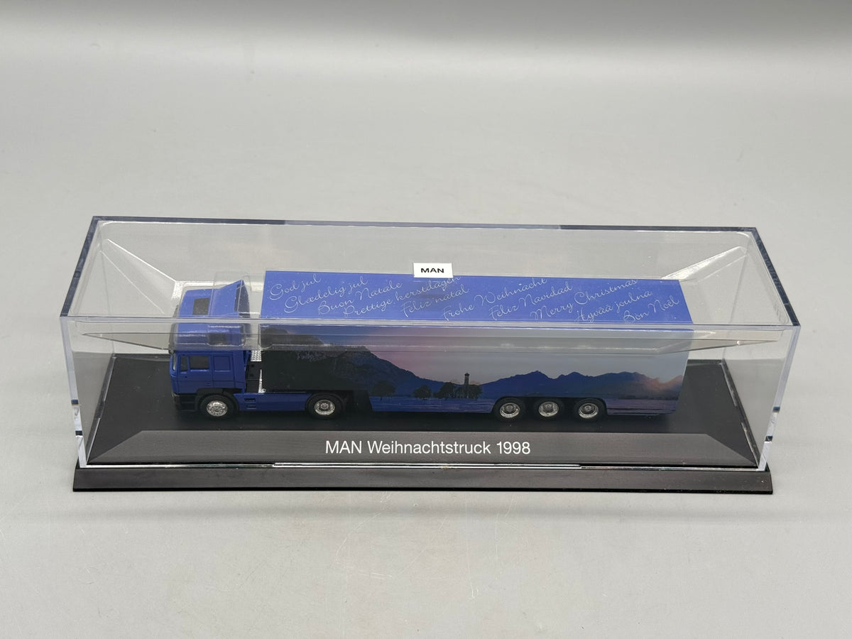 Modell LKW 1:87 Herpa MAN F2000 Weihnachtstruck 1998 mit OVP