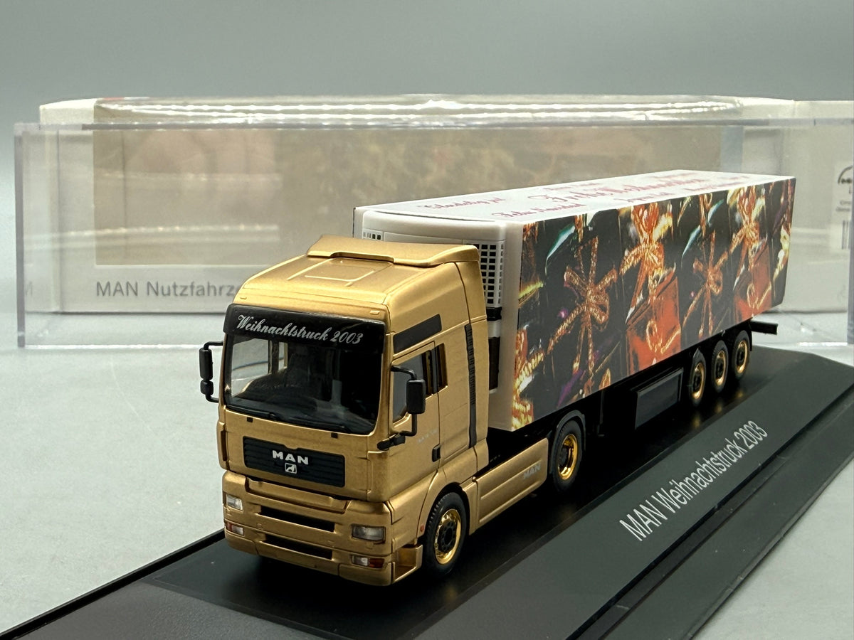 Modell LKW 1:87 Herpa MAN TGA 18.530 Weihnachtstruck 2003 mit OVP