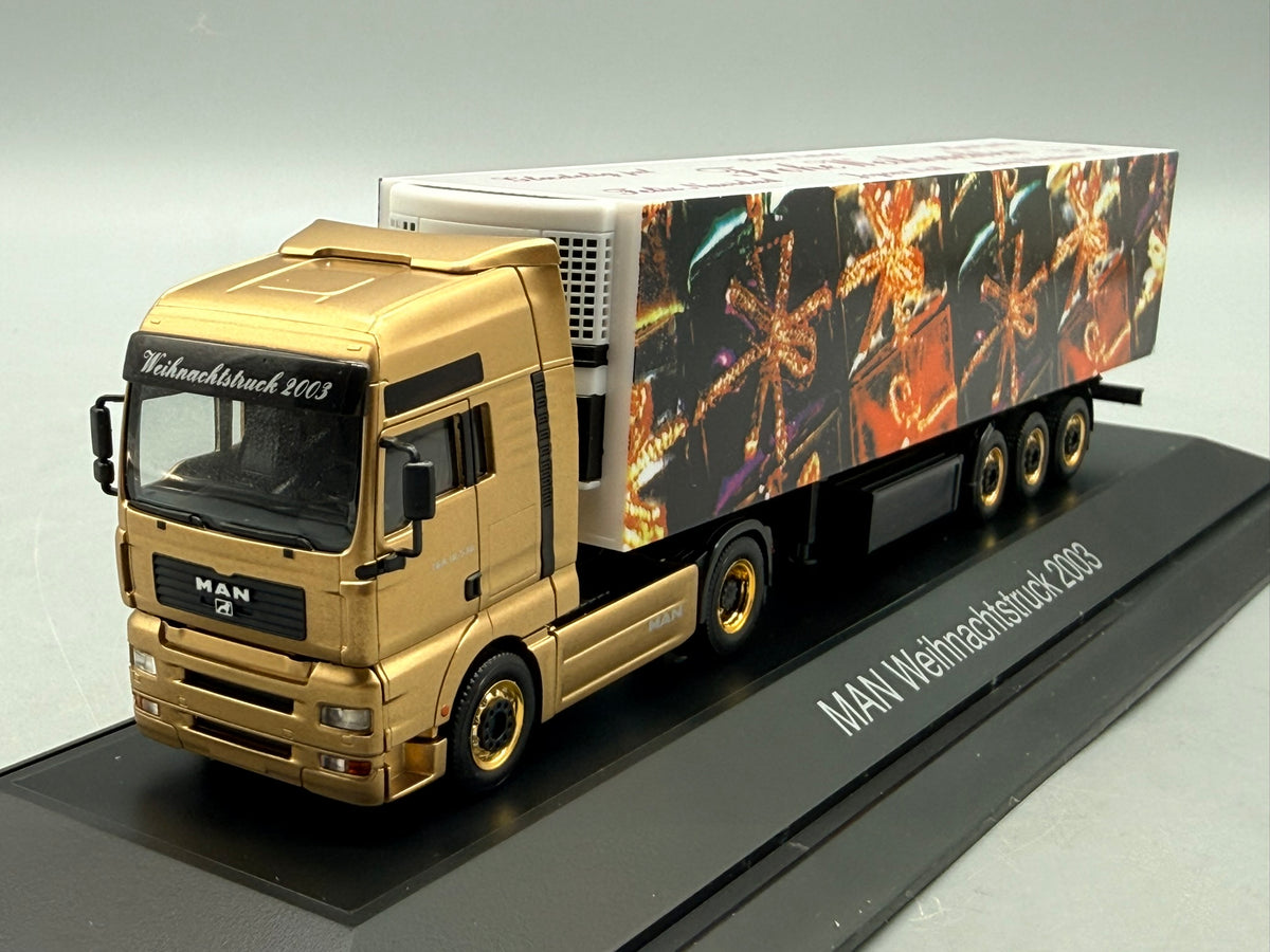 Modell LKW 1:87 Herpa MAN TGA 18.530 Weihnachtstruck 2003 mit OVP