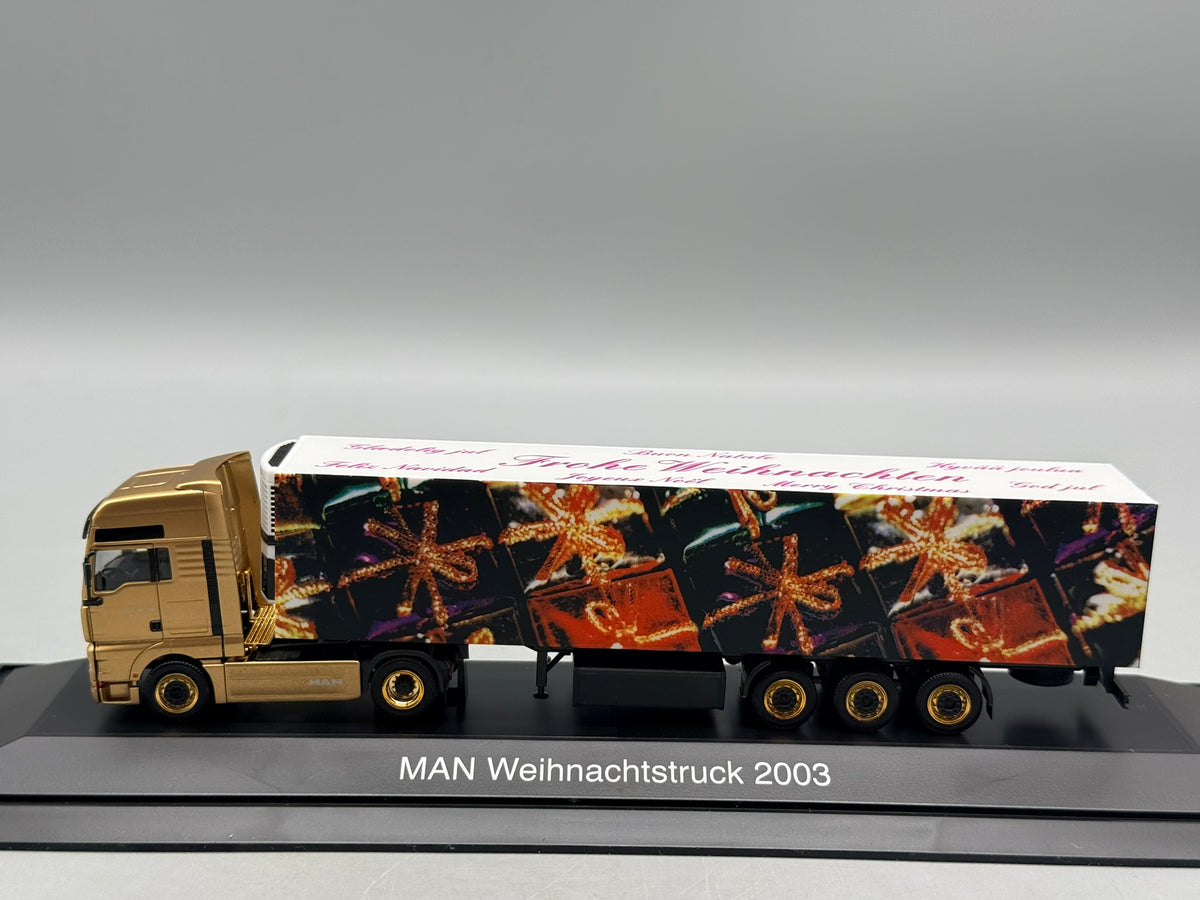 Modell LKW 1:87 Herpa MAN TGA 18.530 Weihnachtstruck 2003 mit OVP