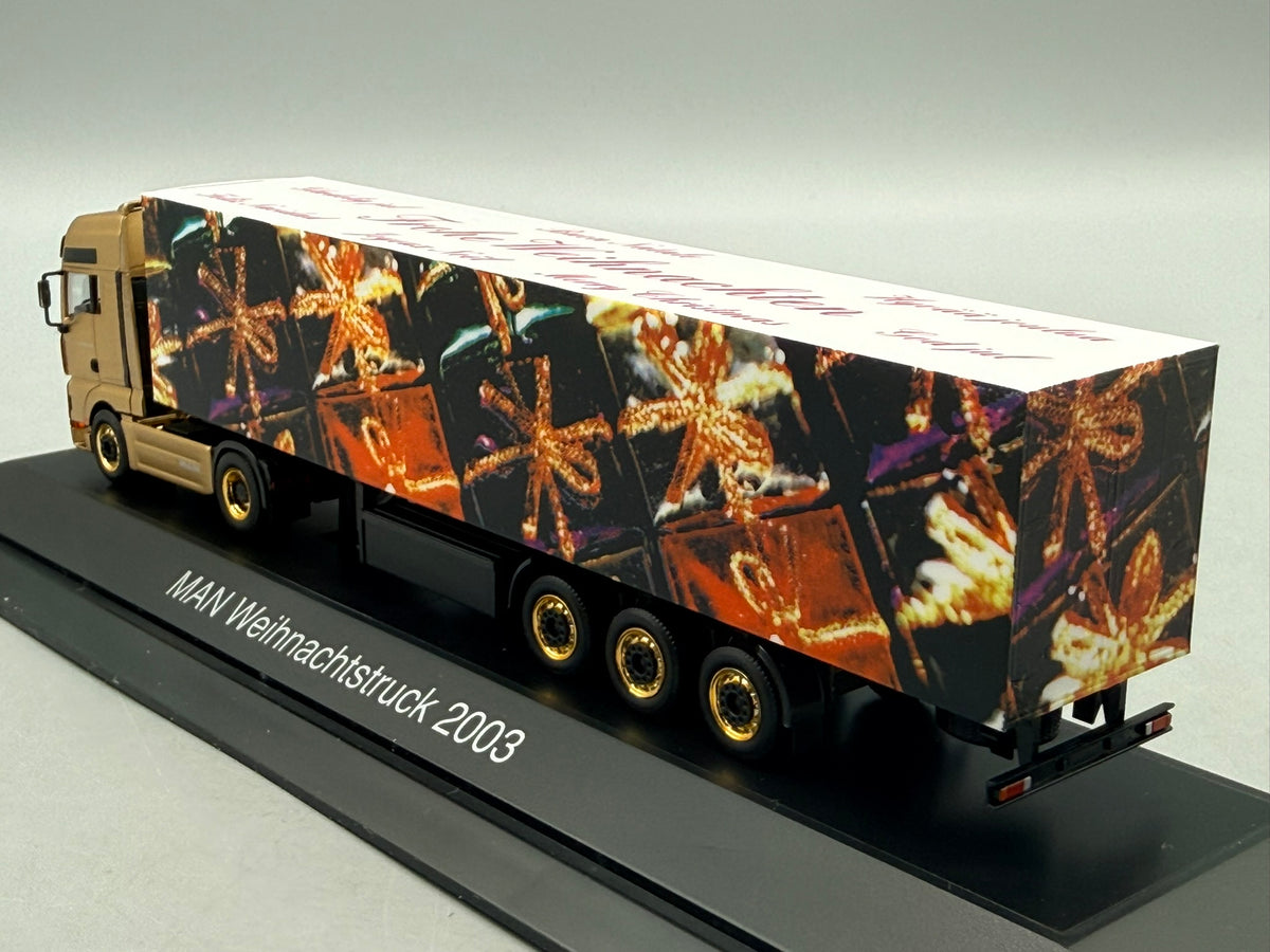 Modell LKW 1:87 Herpa MAN TGA 18.530 Weihnachtstruck 2003 mit OVP