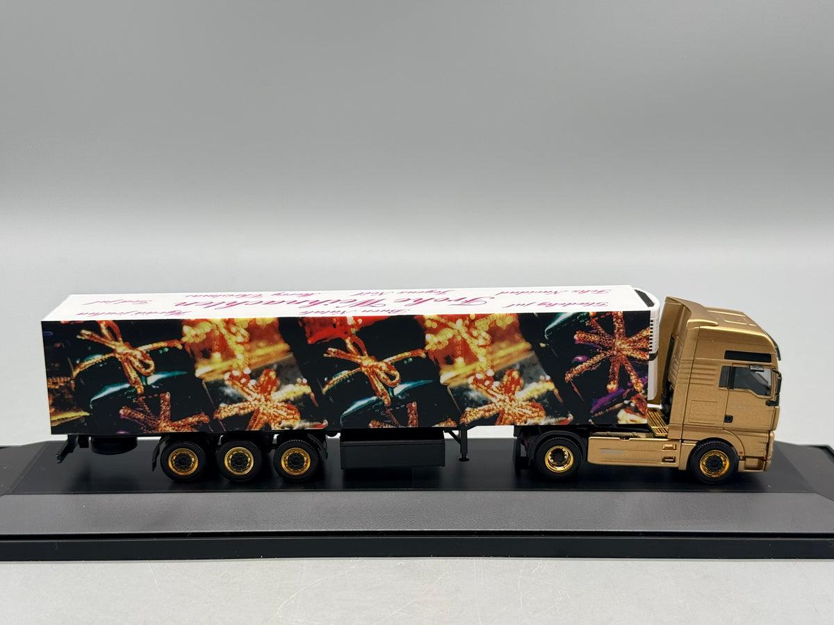 Modell LKW 1:87 Herpa MAN TGA 18.530 Weihnachtstruck 2003 mit OVP