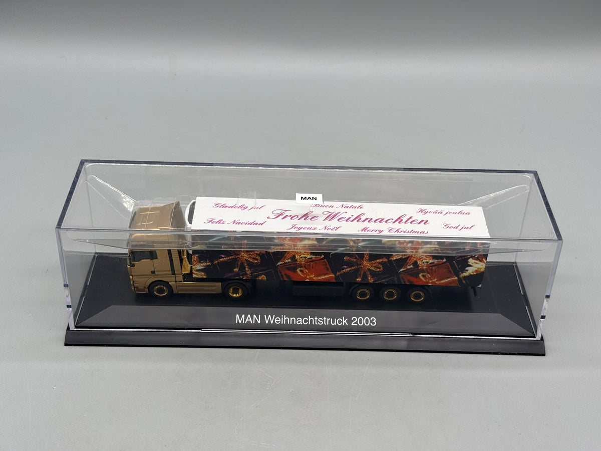 Modell LKW 1:87 Herpa MAN TGA 18.530 Weihnachtstruck 2003 mit OVP