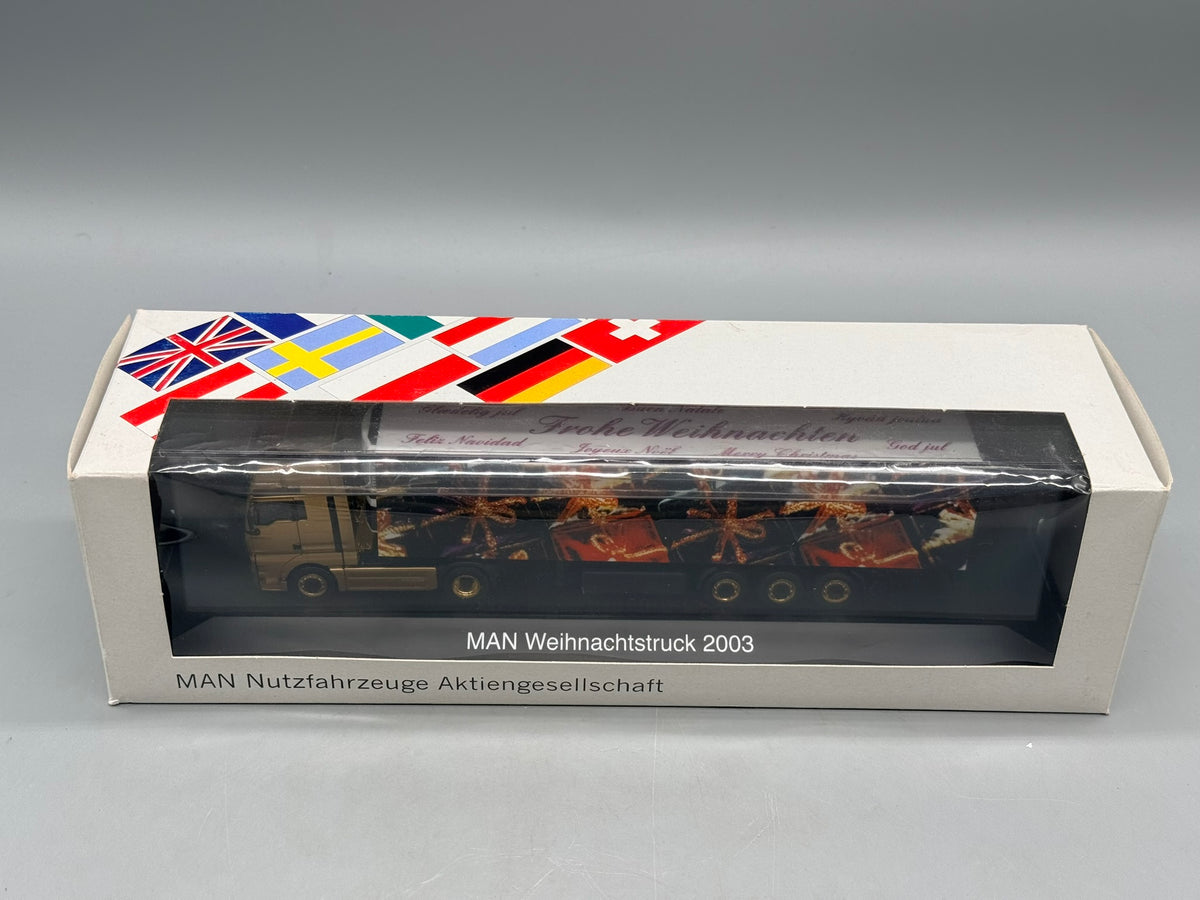 Modell LKW 1:87 Herpa MAN TGA 18.530 Weihnachtstruck 2003 mit OVP