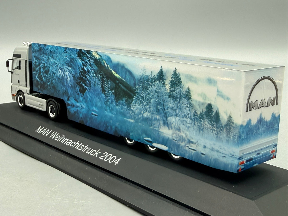 Modell LKW 1:87 Herpa MAN TGA 18.530 Weihnachtstruck 2004 mit OVP