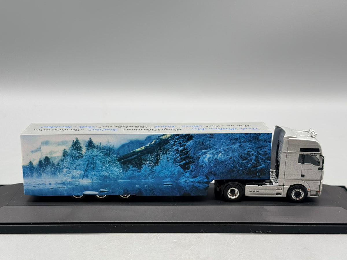 Modell LKW 1:87 Herpa MAN TGA 18.530 Weihnachtstruck 2004 mit OVP