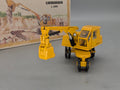 Excavadora modelo 1:50 NZG 538 Liebherr L300 "la primera excavadora móvil" con embalaje original