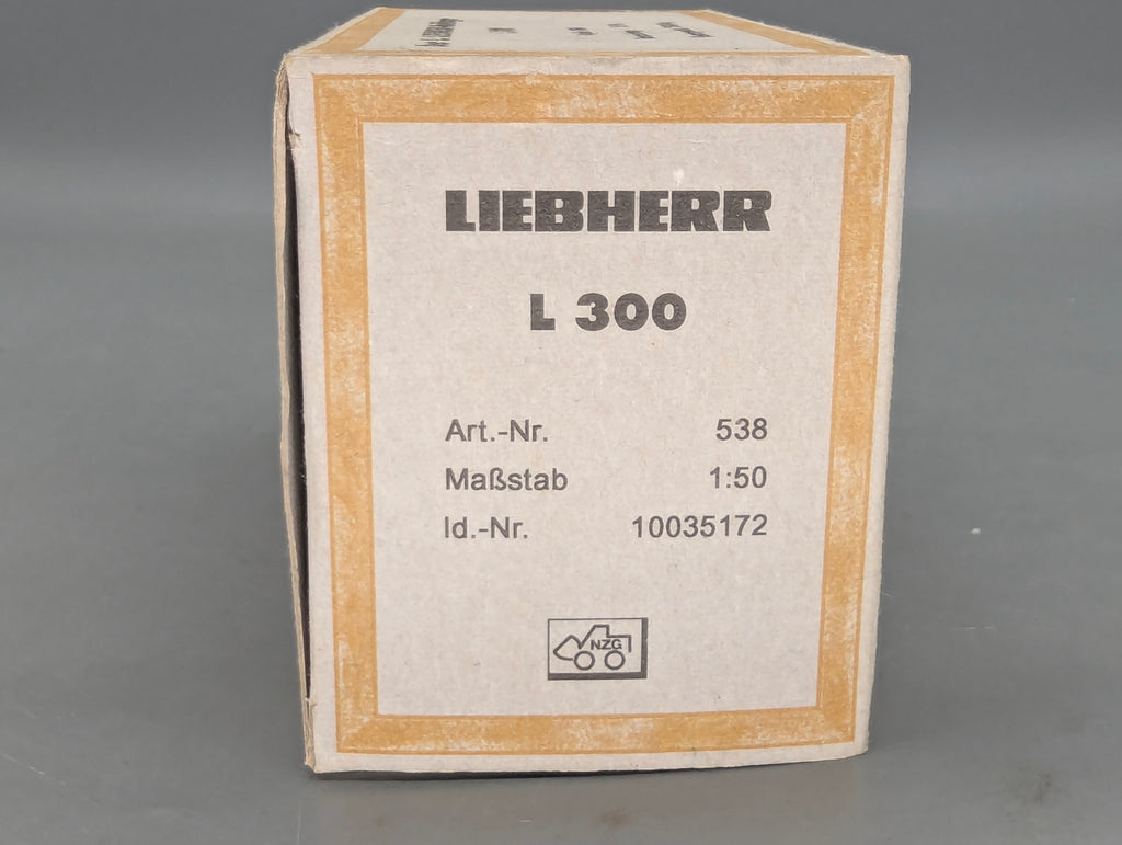 Excavadora modelo 1:50 NZG 538 Liebherr L300 "la primera excavadora móvil" con embalaje original