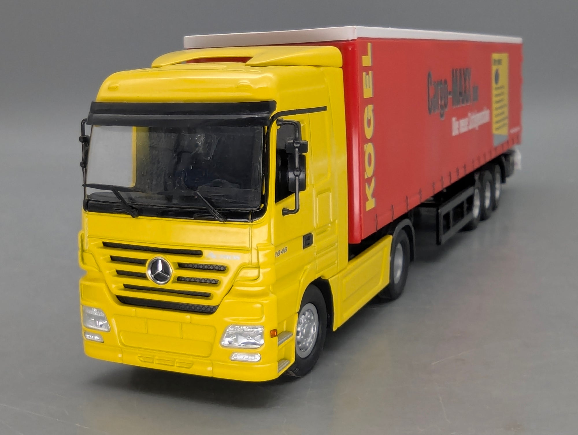 LKW Modell 1:50 NZG 555 Mercedes Benz Actros Kögel Gardinenauflieger mit OVP