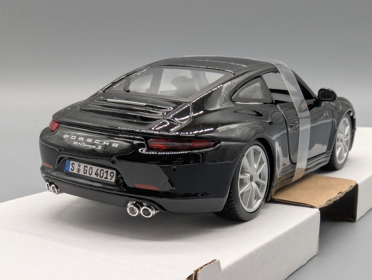 Modellautos 1:24 Bburago Porsche 911 Carrera S Schwarz mit OVP