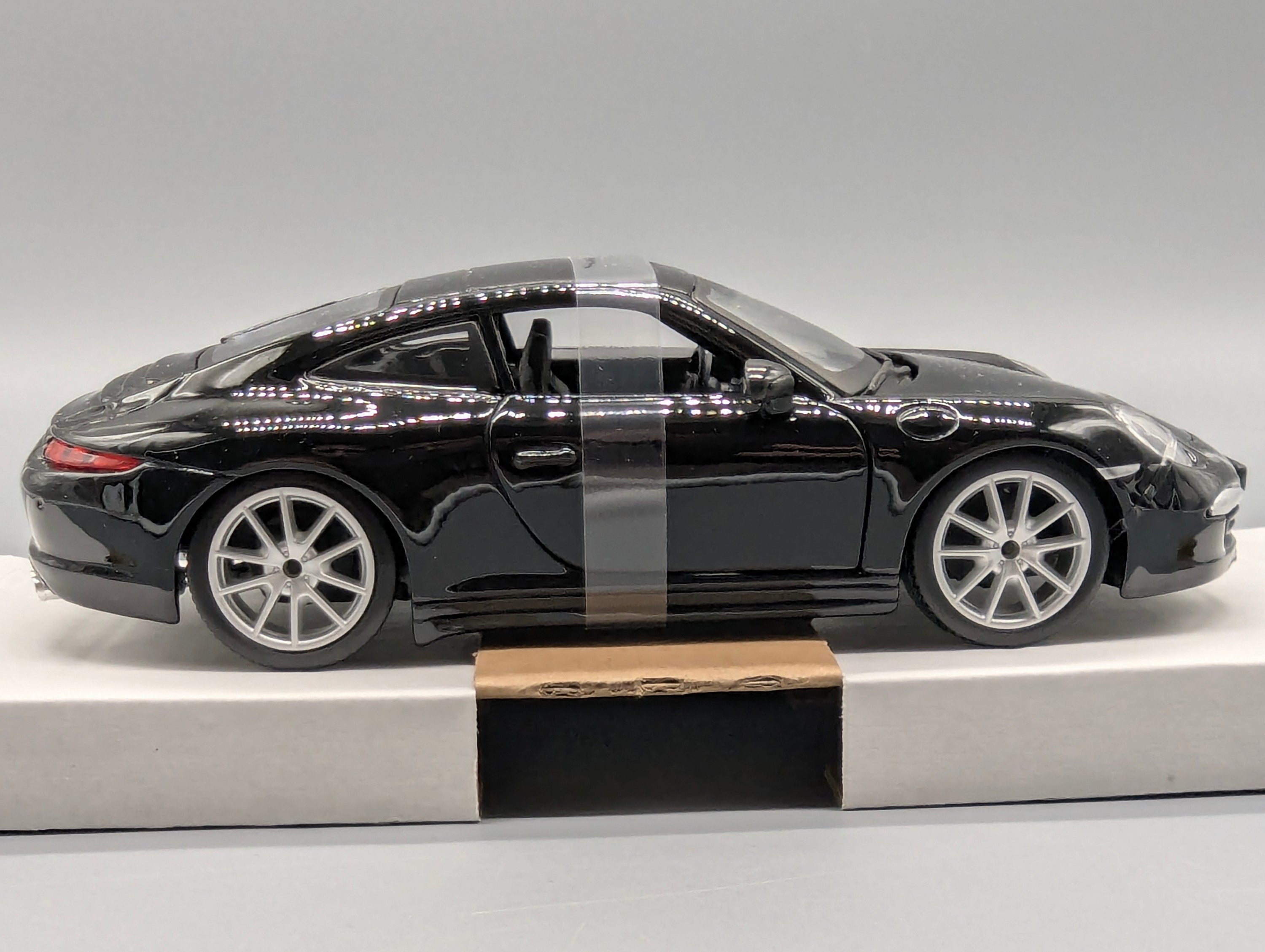 Modellautos 1:24 Bburago Porsche 911 Carrera S Schwarz mit OVP