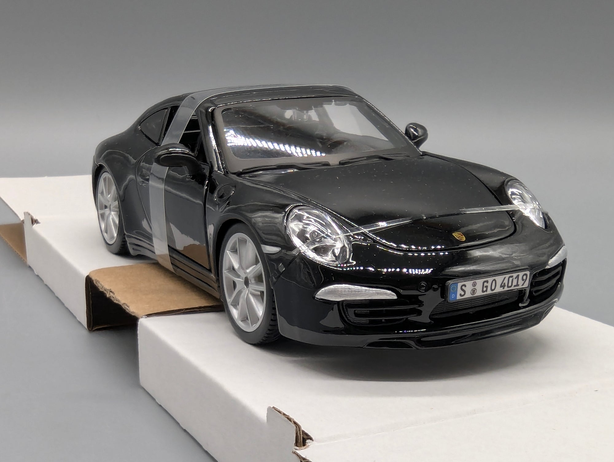 Modellautos 1:24 Bburago Porsche 911 Carrera S Schwarz mit OVP