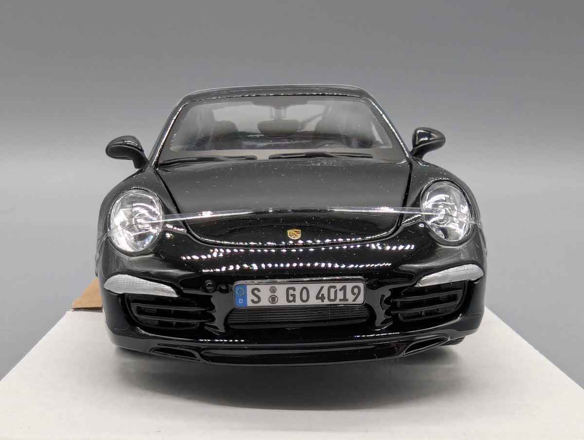 Modellautos 1:24 Bburago Porsche 911 Carrera S Schwarz mit OVP