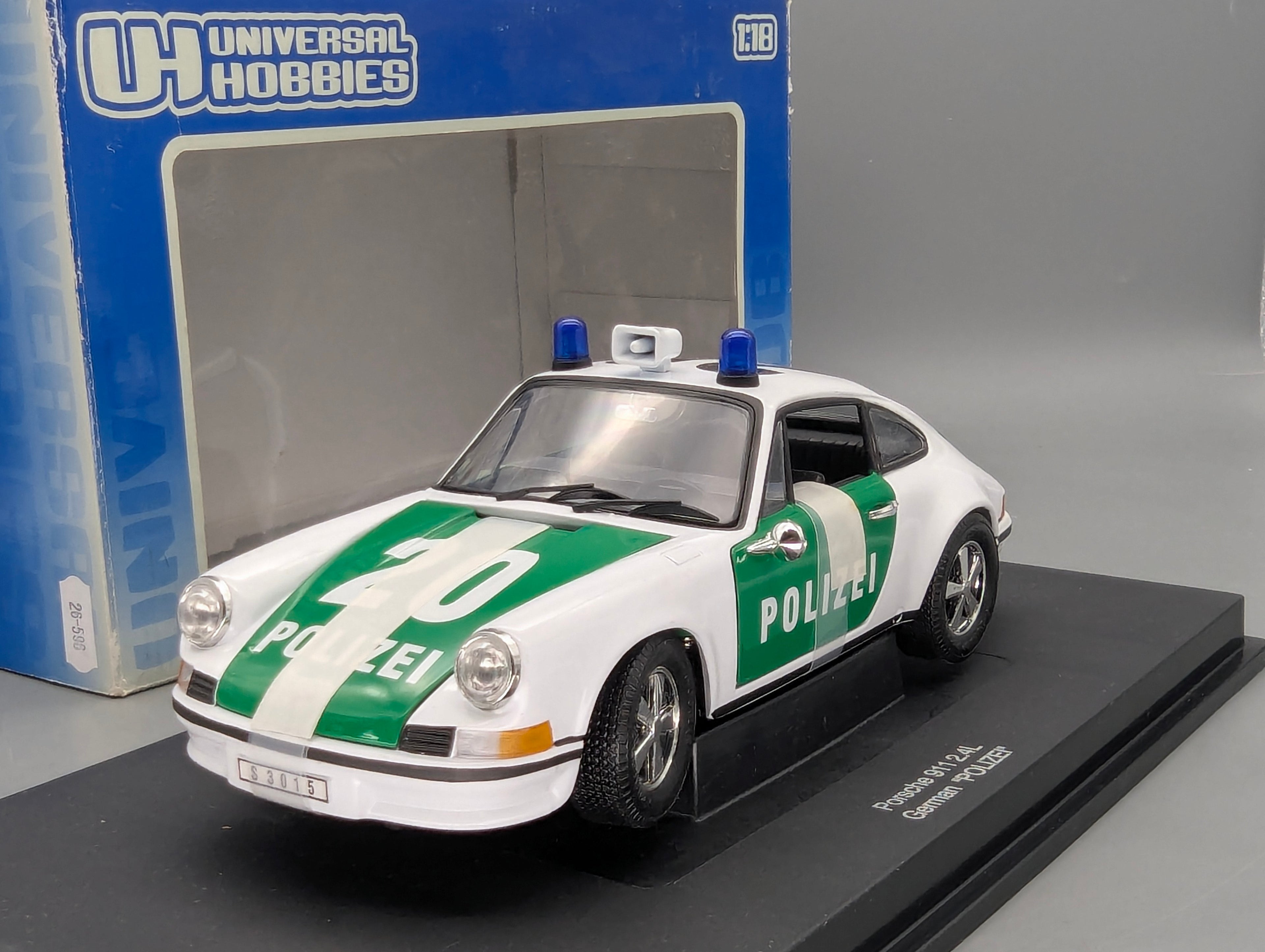 Modellautos 1:18 Universal Hobbies Porsche 911 Polizei OVP