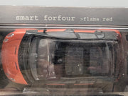 Modellautos 1:18 Kyosho Smart Forfour Flame Red mit Dealer OVP