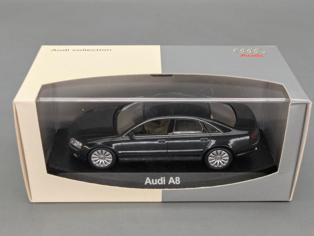 Modellautos 1:43 Minichamps Audi A8 Dunkelblau Metallic mit Dealer OVP