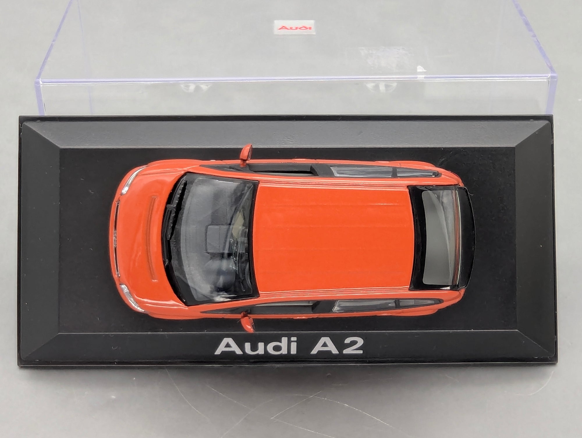 Modellautos 1:43 Minichamps Audi A2 Jaipurrot mit Dealer OVP