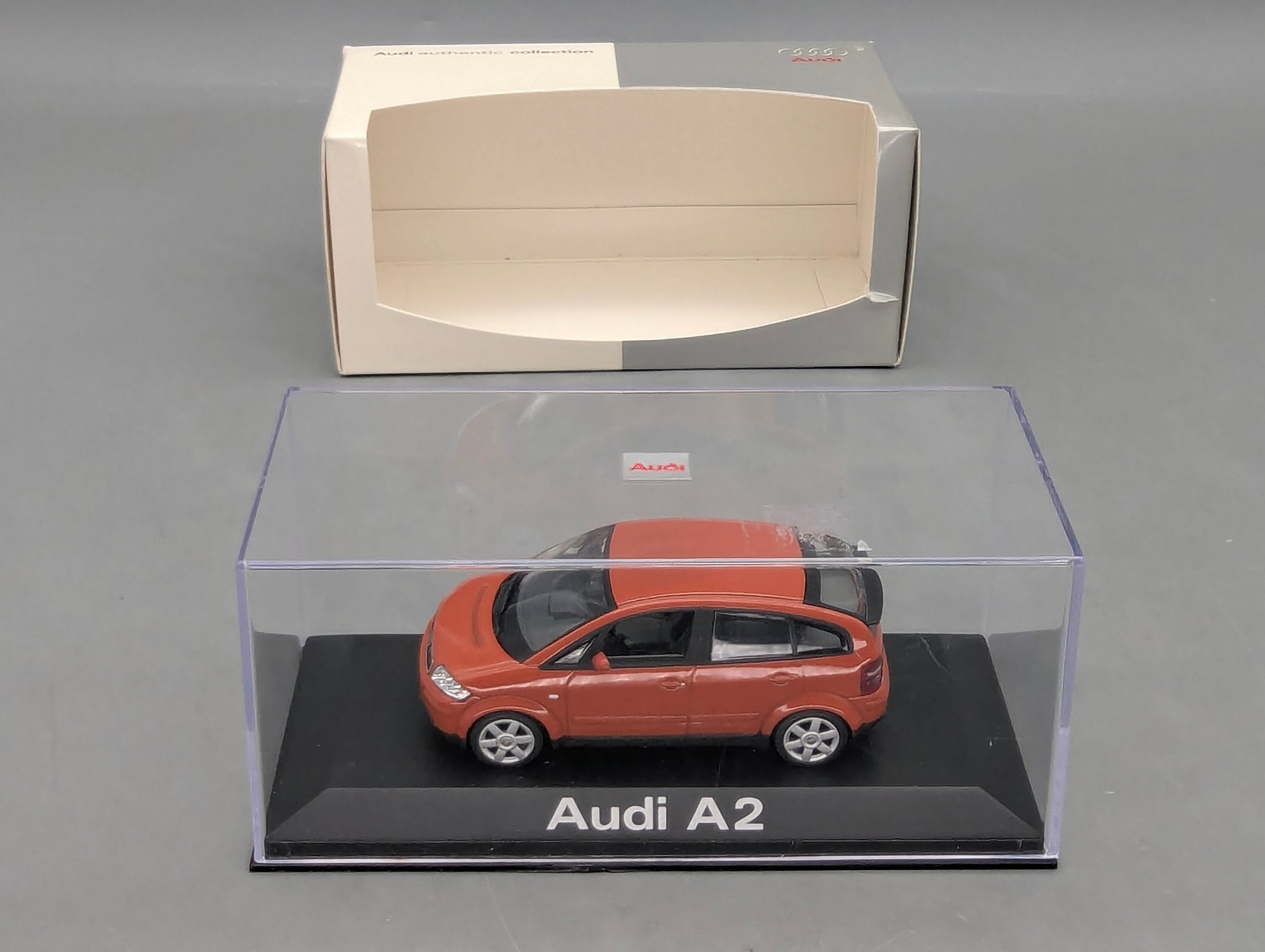 Modellautos 1:43 Minichamps Audi A2 Jaipurrot mit Dealer OVP