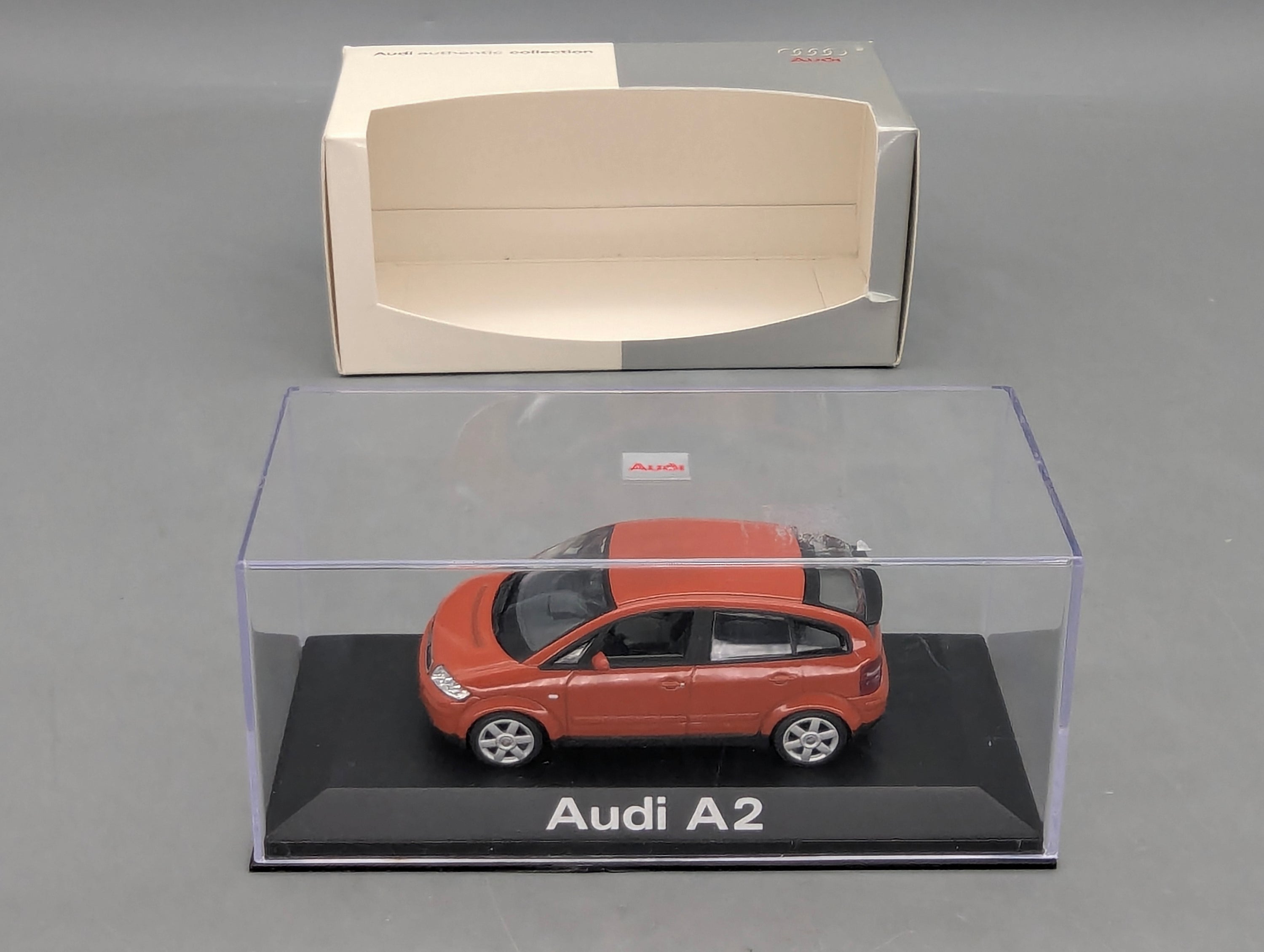 Modellautos 1:43 Minichamps Audi A2 Jaipurrot mit Dealer OVP