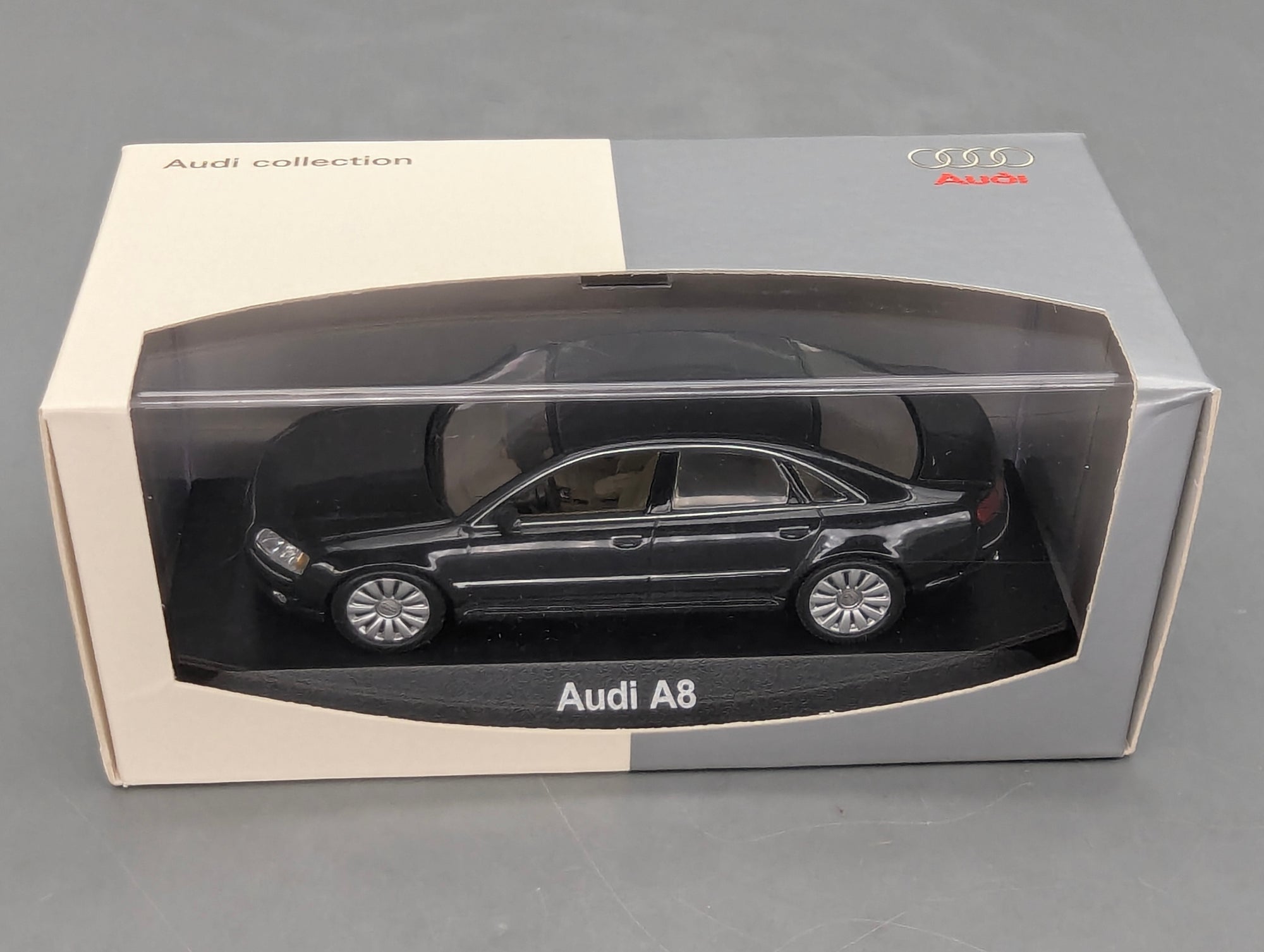 Modellautos 1:43 Minichamps Audi A8 Phantomschwarz Schwarz mit Dealer OVP
