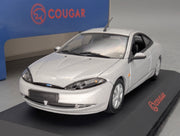 Modellautos 1:43 Minichamps Ford Cougar Silber mit Dealer OVP
