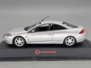 Modellautos 1:43 Minichamps Ford Cougar Silber mit Dealer OVP