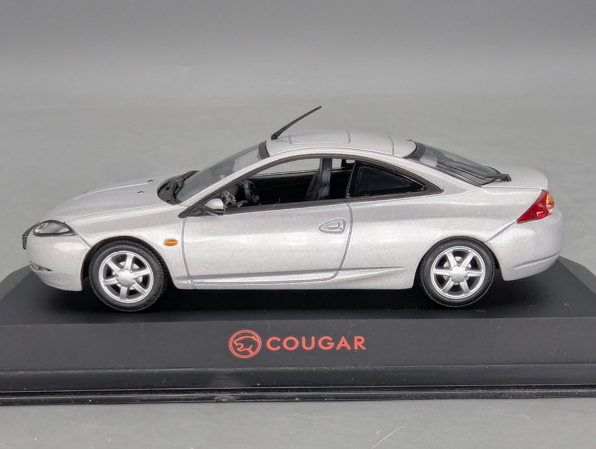Modellautos 1:43 Minichamps Ford Cougar Silber mit Dealer OVP