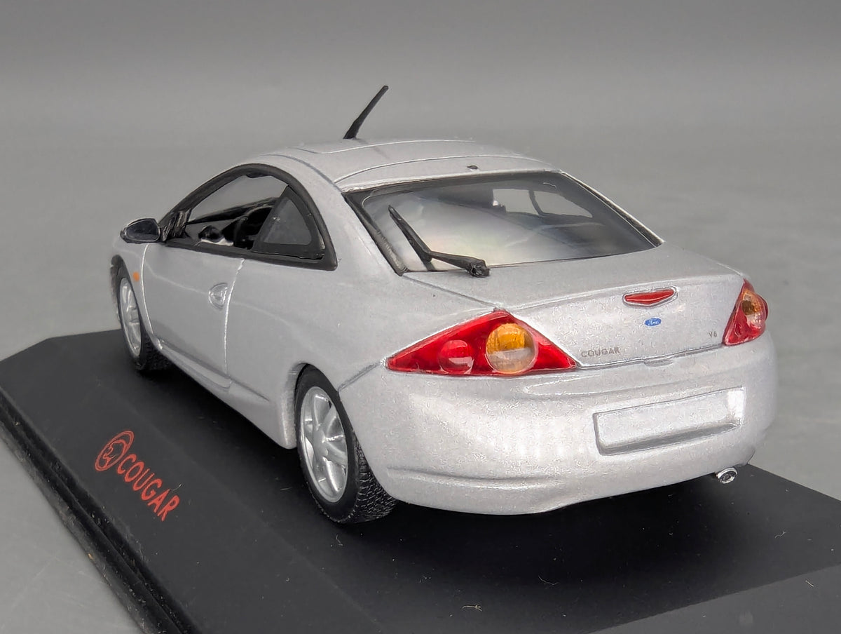 Modellautos 1:43 Minichamps Ford Cougar Silber mit Dealer OVP