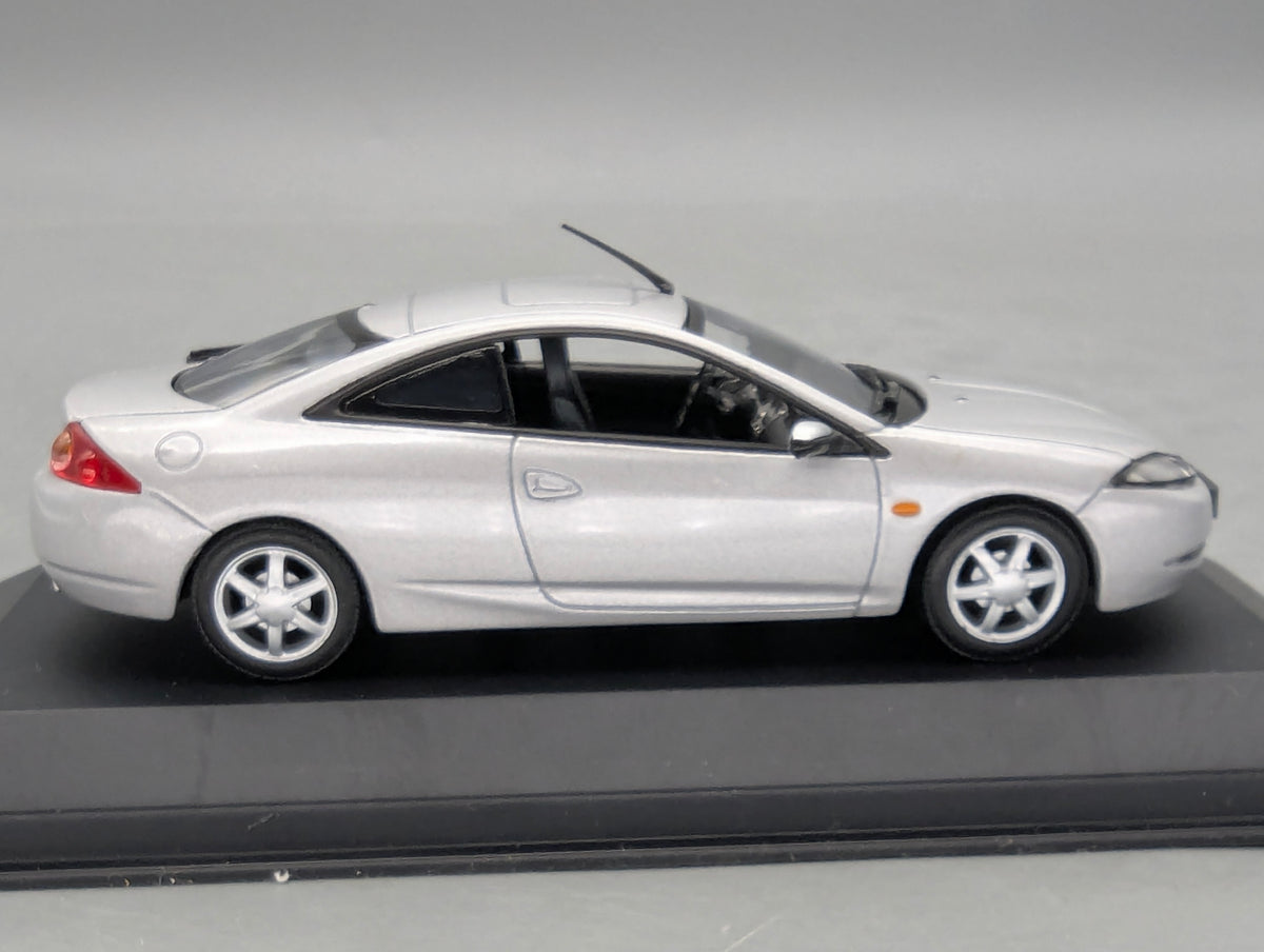 Modellautos 1:43 Minichamps Ford Cougar Silber mit Dealer OVP