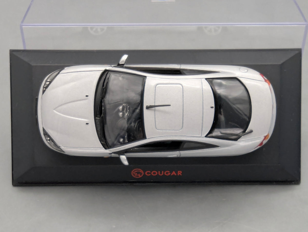 Modellautos 1:43 Minichamps Ford Cougar Silber mit Dealer OVP