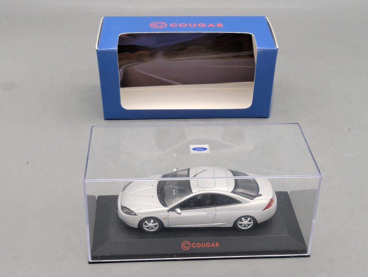 Modellautos 1:43 Minichamps Ford Cougar Silber mit Dealer OVP