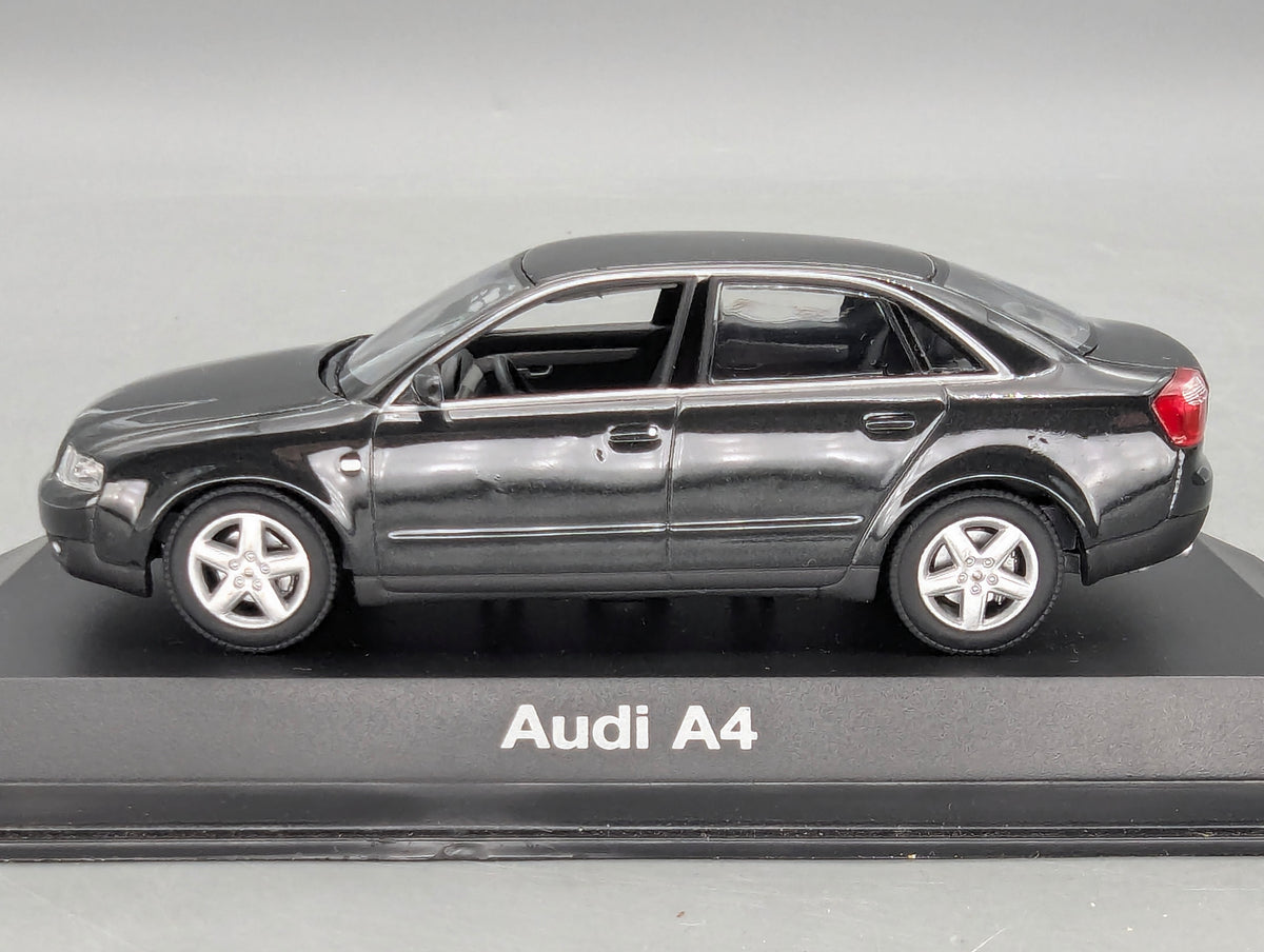 Modellautos 1:43 Minichamps Audi A4 3.0 Schwarz mit Dealer OVP