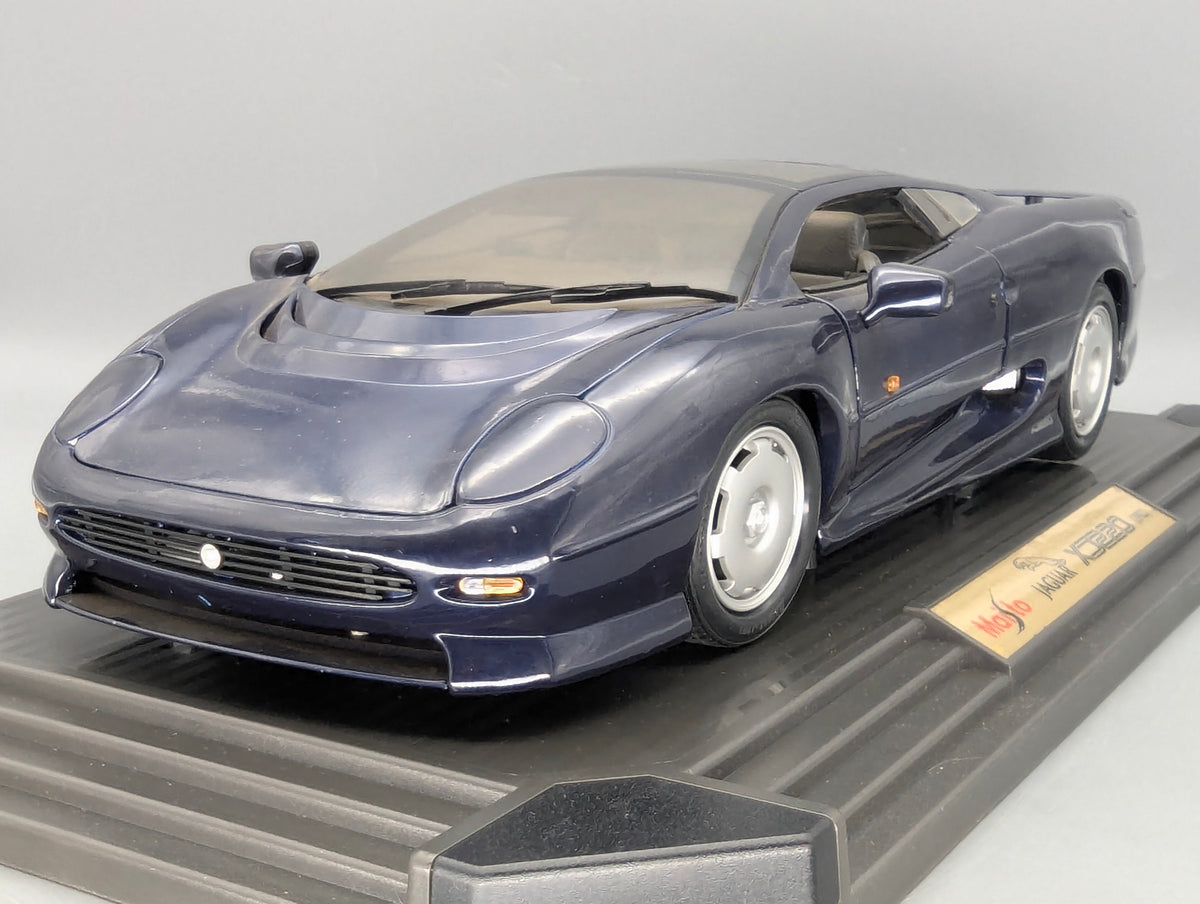Modellautos 1:12 Maisto Jaguar XJ 220 1992 Dunkelblau mit OVP