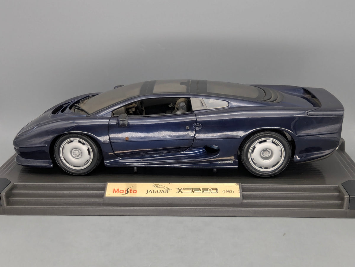 Modellautos 1:12 Maisto Jaguar XJ 220 1992 Dunkelblau mit OVP