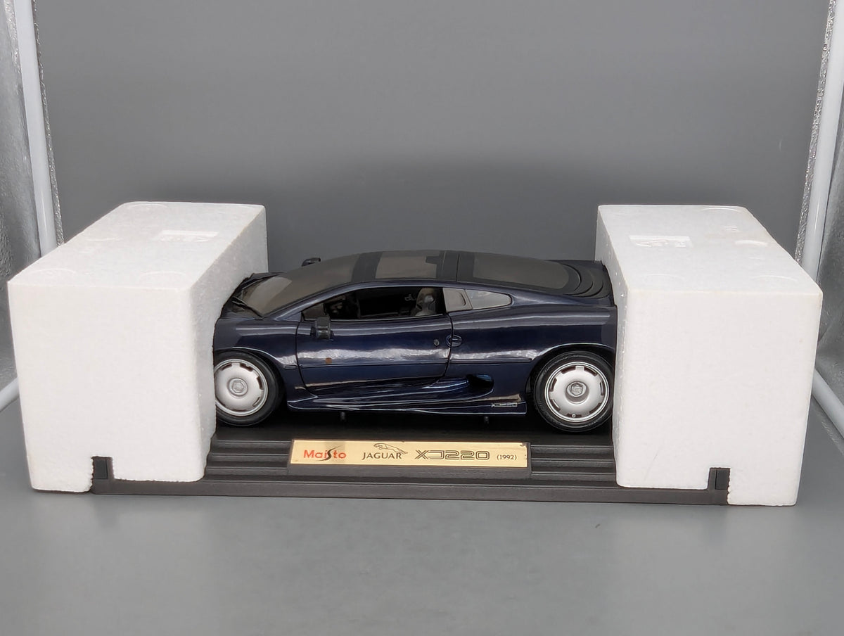 Modellautos 1:12 Maisto Jaguar XJ 220 1992 Dunkelblau mit OVP