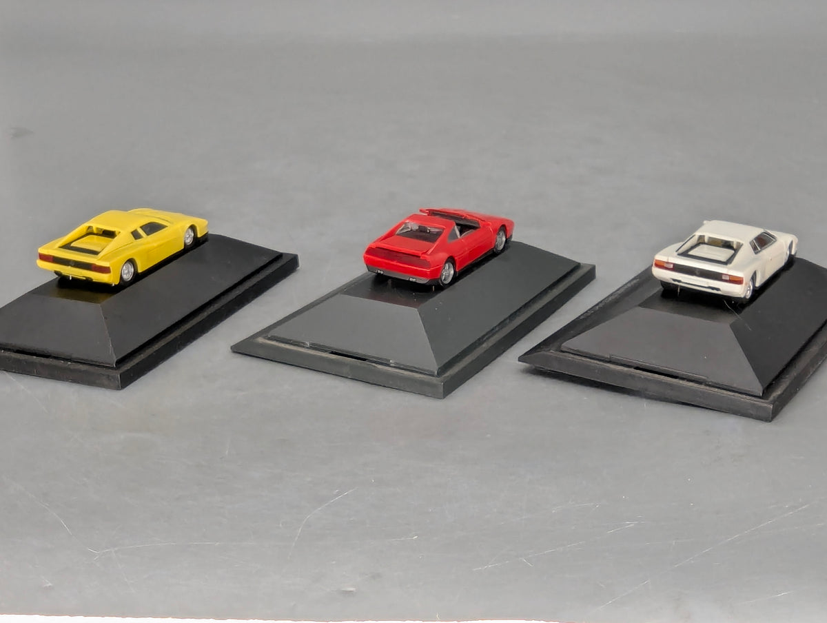 Modellautos 1:87 Herpa Ferrari 3-tlg Set 2x Testarossa 1x 348ts mit Vitrinen