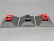 Modellautos 1:87 Herpa Ferrari 3-tlg Set 2x rot, 1x schwarz mit Vitrinen