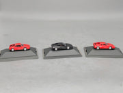 Modellautos 1:87 Herpa Ferrari 3-tlg Set 2x rot, 1x schwarz mit Vitrinen