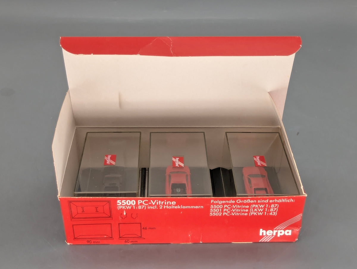Modellautos 1:87 Herpa Ferrari 3-tlg Set 2x rot, 1x schwarz mit Vitrinen