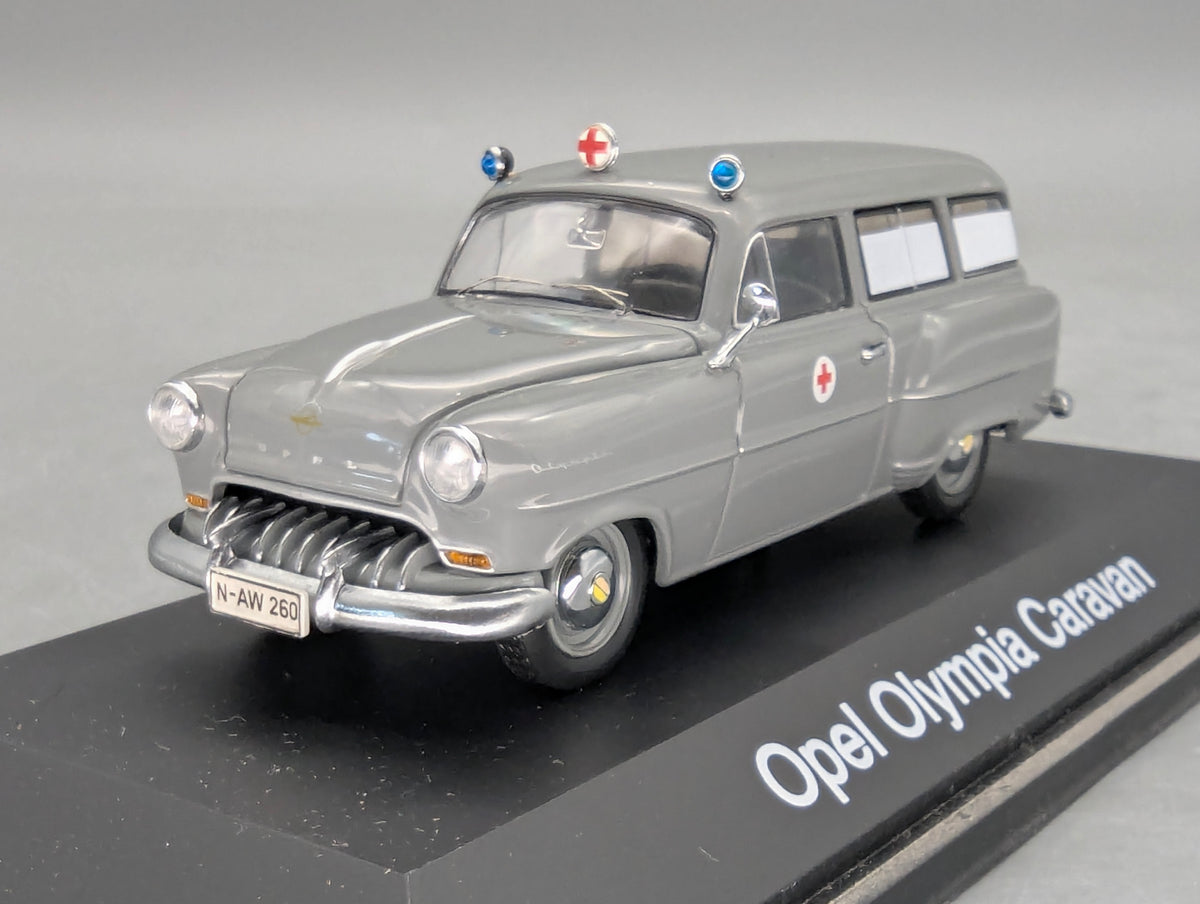 Modellautos 1:43 Schuco Opel Olympia Caravan Krankenwagen Grau mit Vitrine