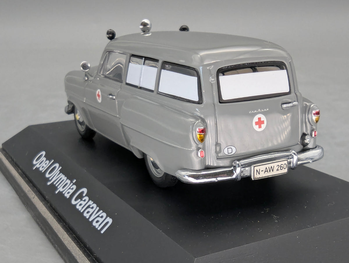 Modellautos 1:43 Schuco Opel Olympia Caravan Krankenwagen Grau mit Vitrine