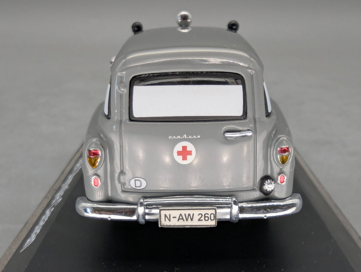 Modellautos 1:43 Schuco Opel Olympia Caravan Krankenwagen Grau mit Vitrine