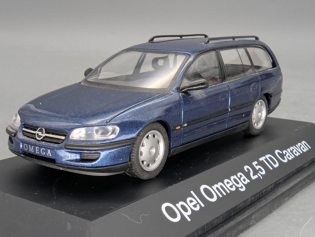 Modellautos 1:43 Schuco Opel Omega B Caravan 2,5 TD Blau Metallic mit OVP