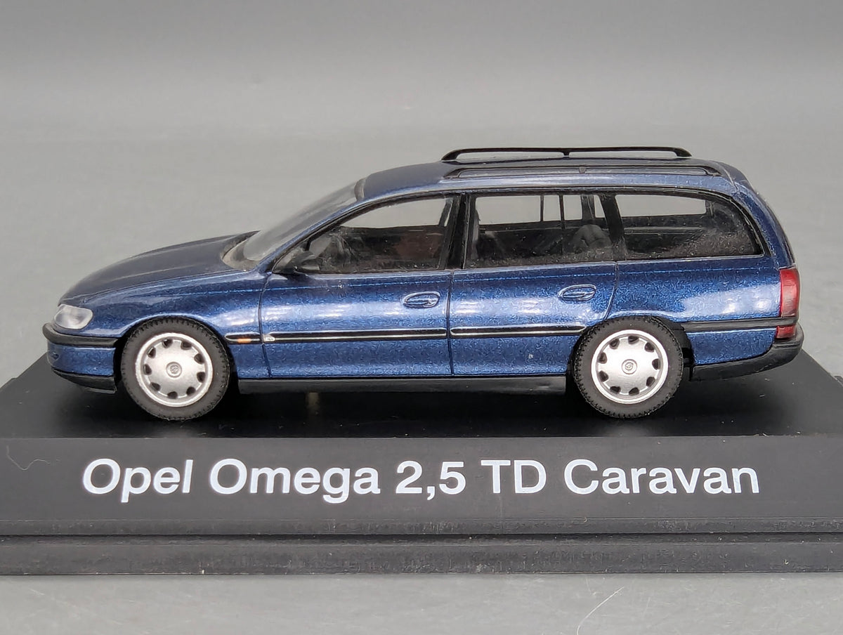 Modellautos 1:43 Schuco Opel Omega B Caravan 2,5 TD Blau Metallic mit OVP