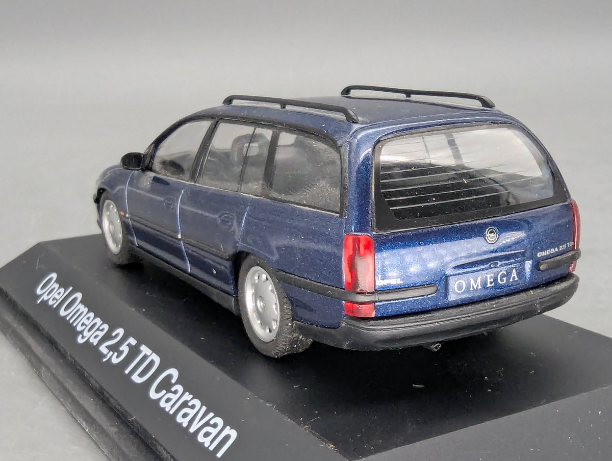 Modellautos 1:43 Schuco Opel Omega B Caravan 2,5 TD Blau Metallic mit OVP